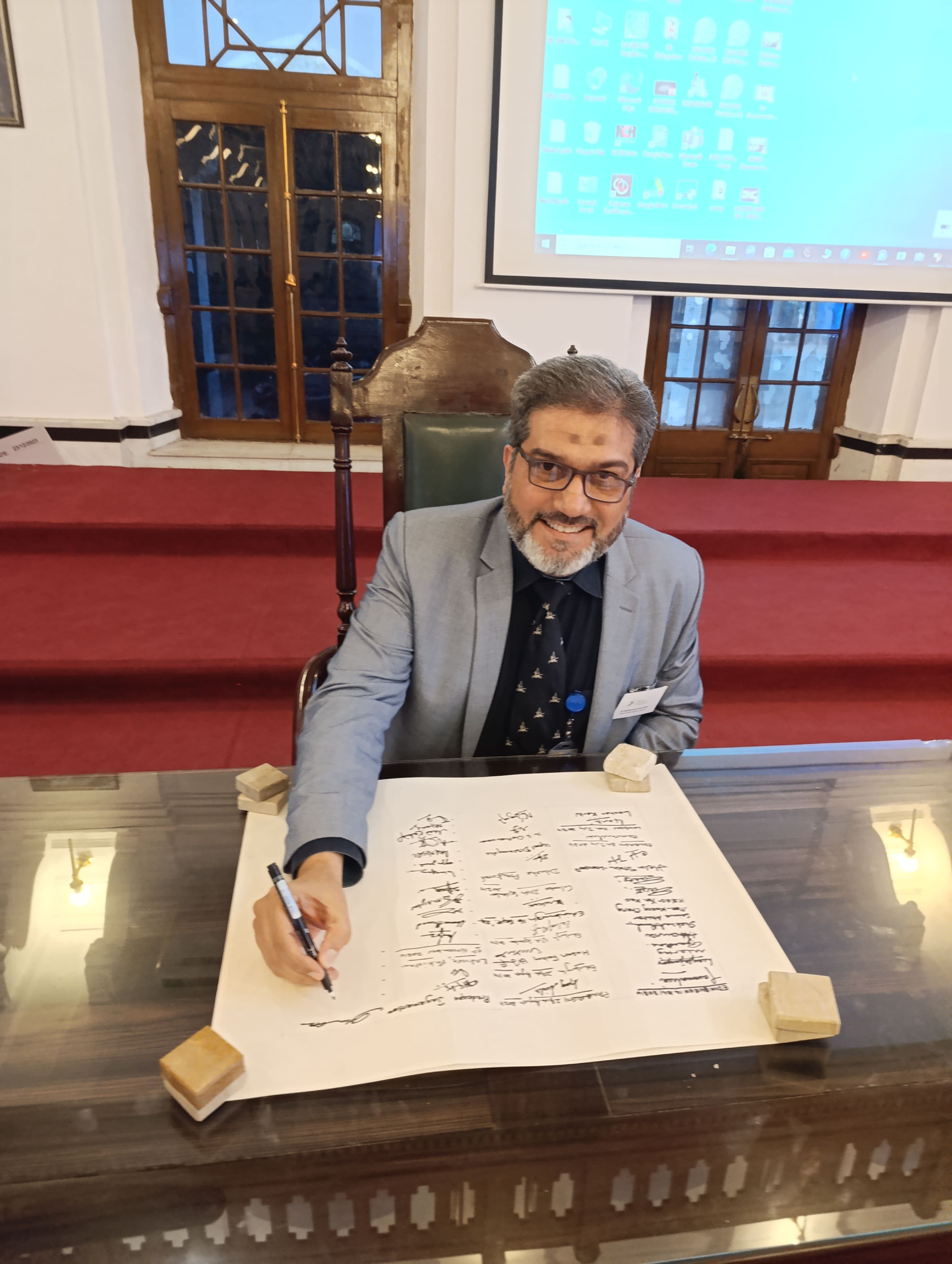 Dr. Asim Rana at an outdoor medical conference venue