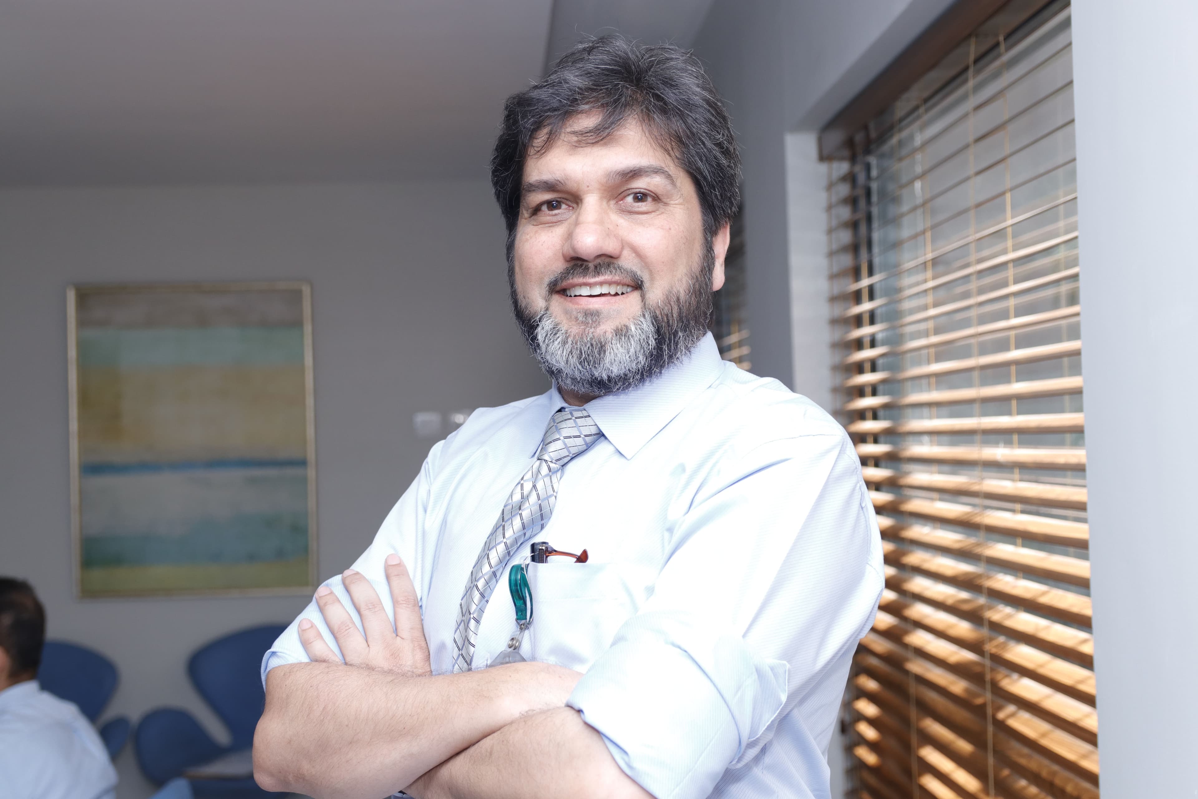 Dr. Asim Rana in a clinical setting